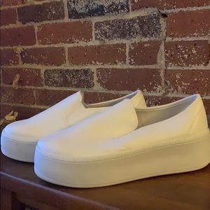 White platform slip-on sneakers